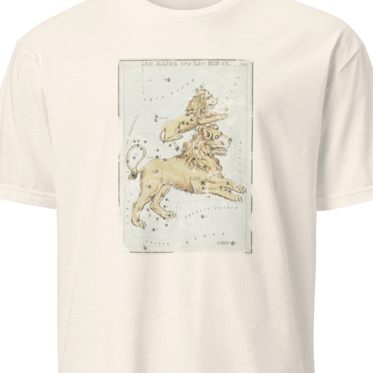 Beige t-shirt with a graphic of a unicorn and starry design on a white background