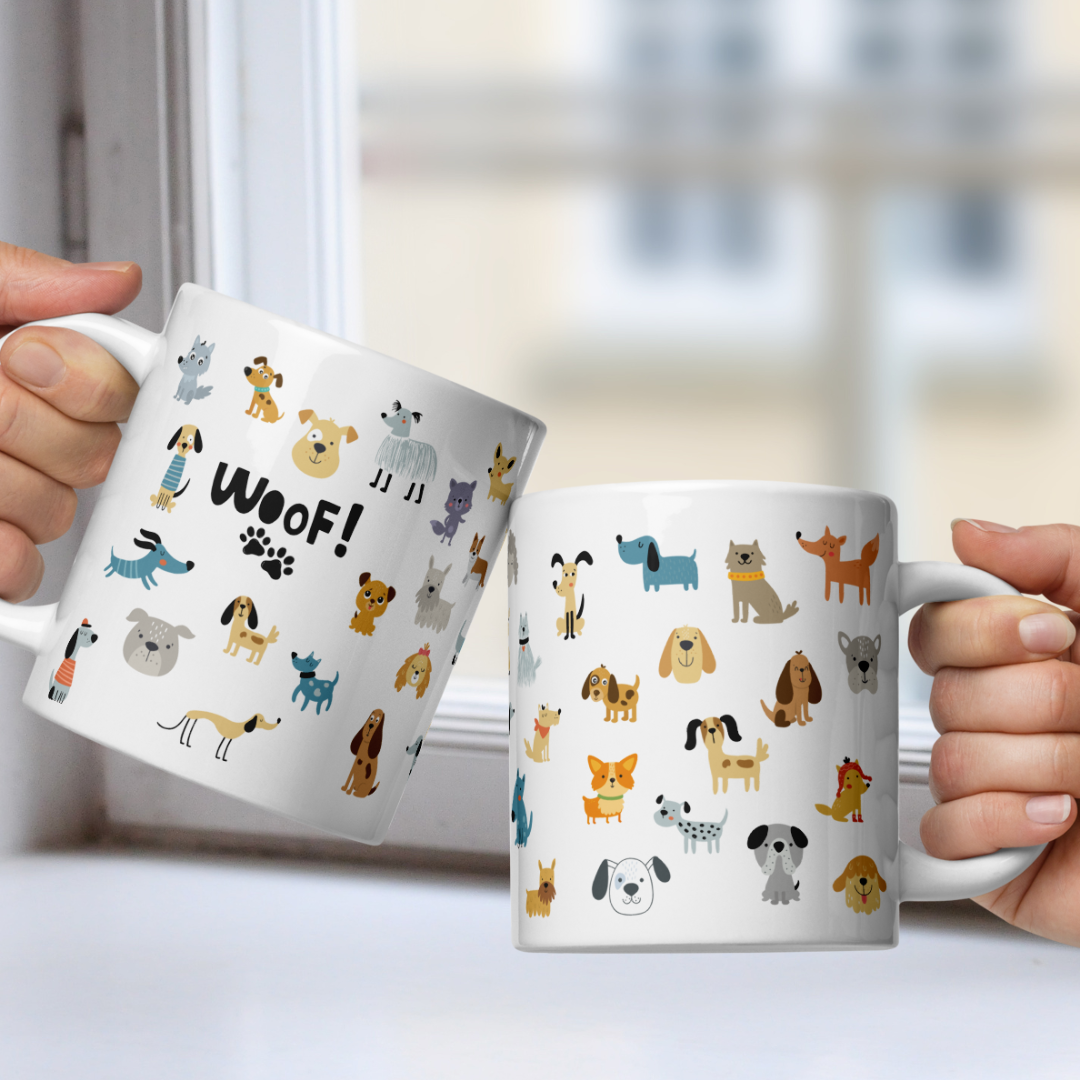 Two mugs with dog illustrations and 'WOOF!' text, held by hands against a blurred window background.