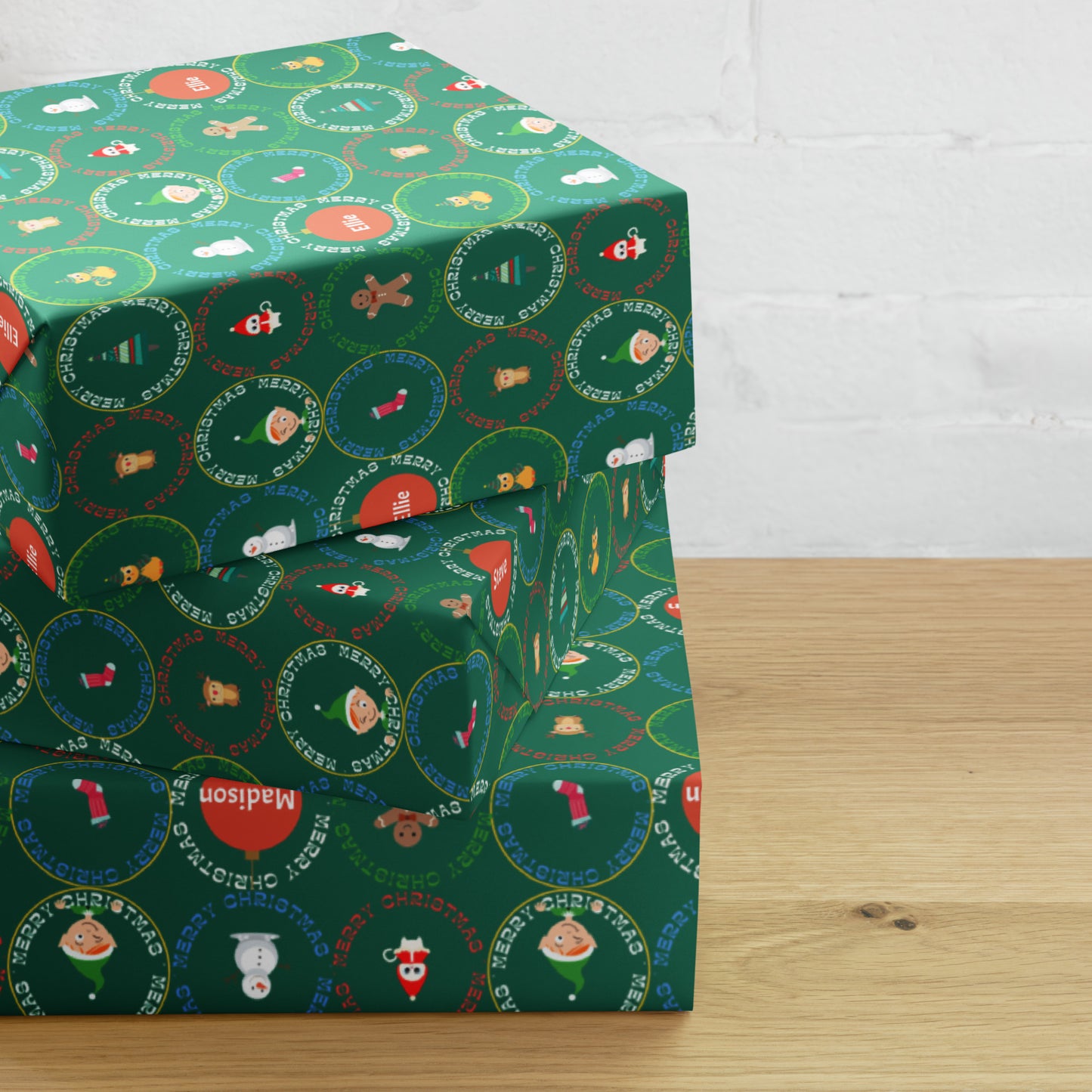Green wrapping paper with festive designs on a wooden surface
