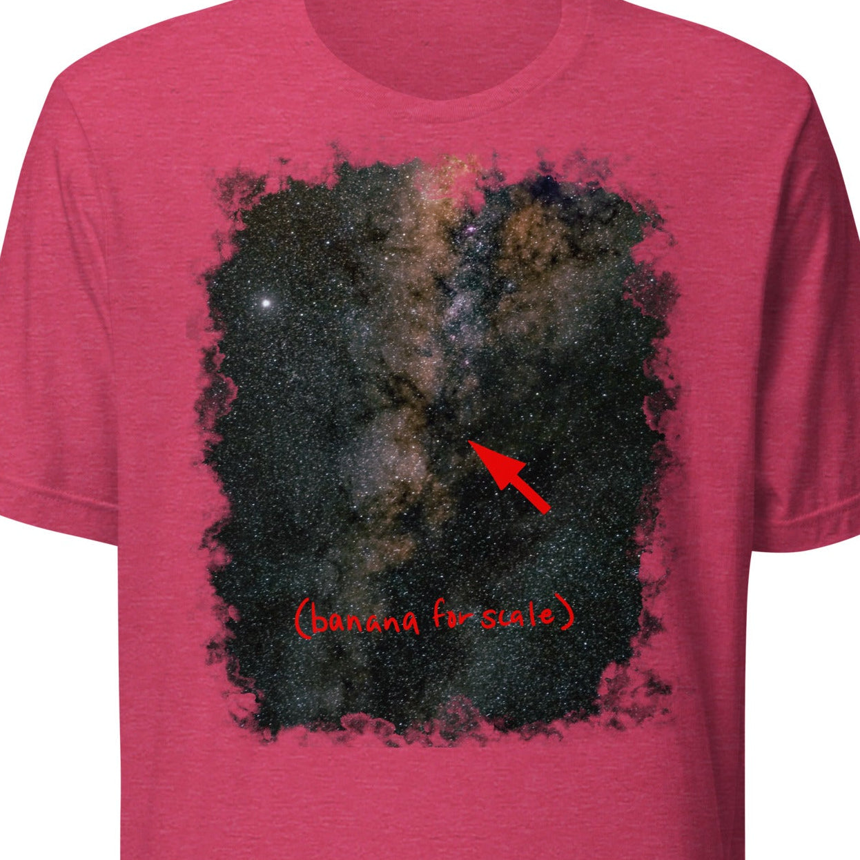 Pink t-shirt with a black abstract design and red text on a white background